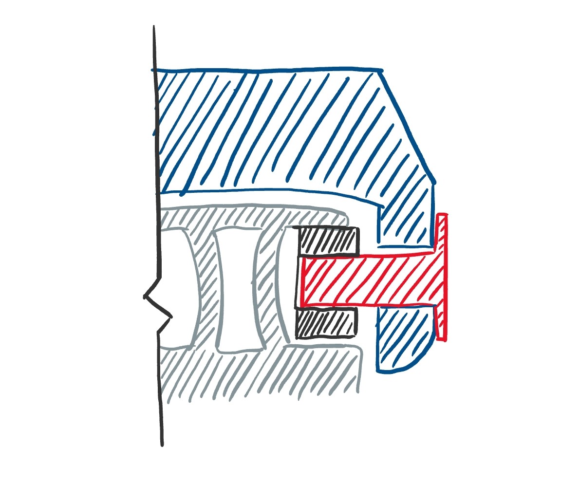 Cutaway sketch of reversed pins in housing; head of pins is now on exterior of car and so they cannot scrape against the track, and the full length of the pin is supported to prevent them from becoming crooked.